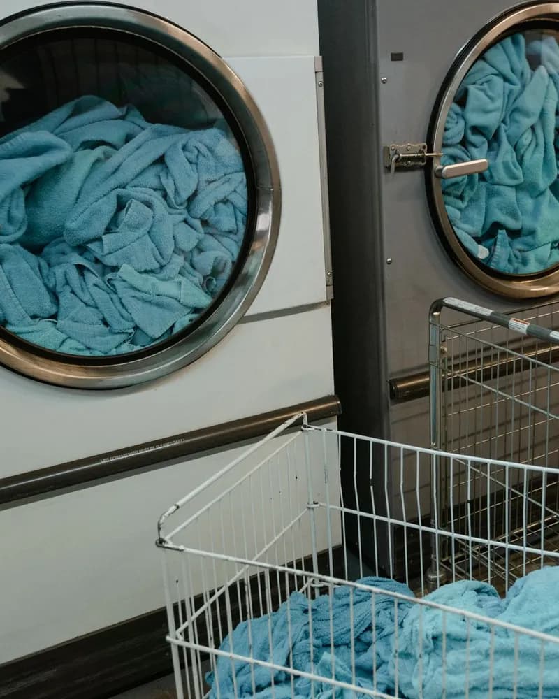 Close-up of a tumble dryer drum full of towels