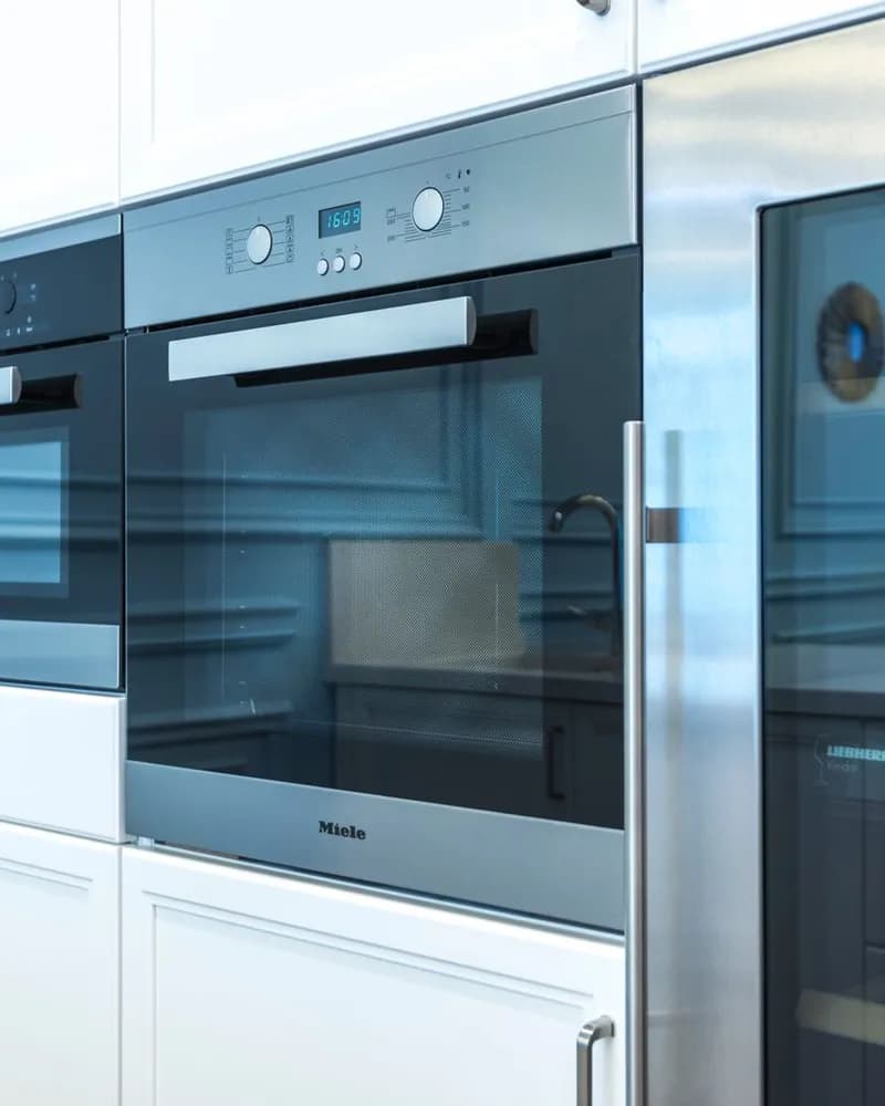 Built-in microwave and oven column in a modern kitchen